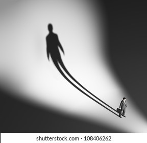 Business Man Casting A Long And Dramatic Shadow