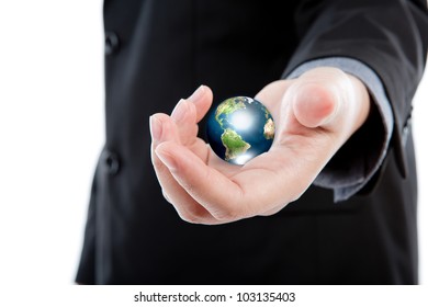 Business man holding the  small world in his hands against white background  (Elements of this image furnished by NASA) - Shutterstock ID 103135403