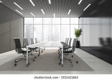 Business Meeting Room With Black Armchairs And White Table, Grey Carpet On White Floor. Black Shelf And Plant Near Windows With City View, 3D Rendering No People