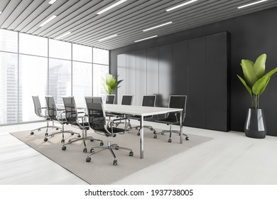 Business Meeting Room With Black Armchairs And White Table, Side View, Grey Carpet On White Floor. Black Shelf And Two Plants, Windows With City View, 3D Rendering No People