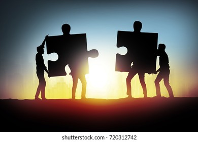 businessman connecting jigsaw puzzle pieces - Powered by Shutterstock