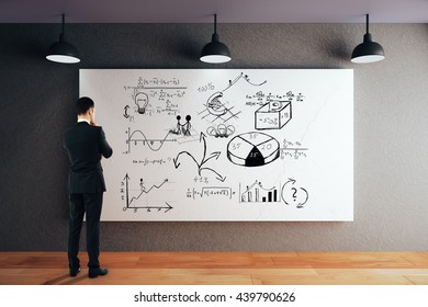 Businessman Looking At Whiteboard With Business Sketch. 3D Rendering