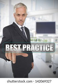 Businessman Touching The Term Best Practice In His Office