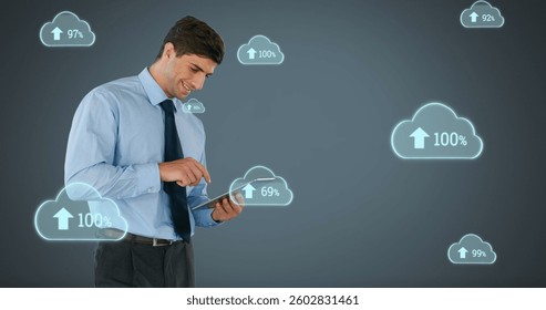 Businessman using tablet with cloud computing icons, analyzing data trends. Technology, digital, innovation, networking, analytics, entrepreneur