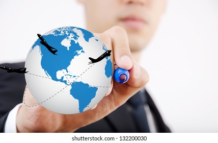 Businessman write World Map Globe for Business and Technology concept. with airplane around the globe.