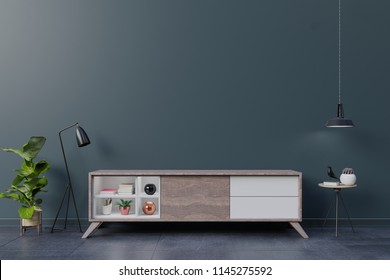 Cabinet TV In Empty Interior Room ,dark Wall Wall With Wood Shelf,lamp ,plants And Table Wood ,3d Rendering