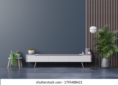 Cabinet TV In Empty Interior Room ,dark Wall With Wood Shelf,lamp ,plants And Table Wood ,3d Rendering