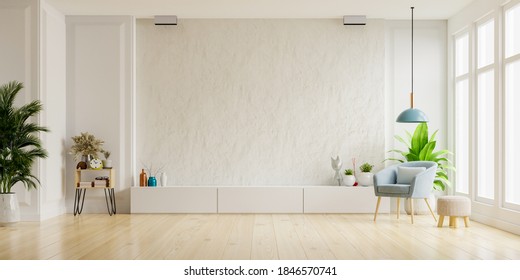 Cabinet For TV On The White Plaster Wall In Living Room With Armchair,minimal Design,3d Rendering