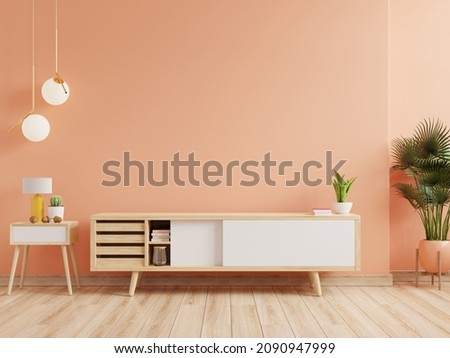 Calming Coral wall background, a modern living room decor with a tv cabinet.3d rendering Foto d'archivio © 