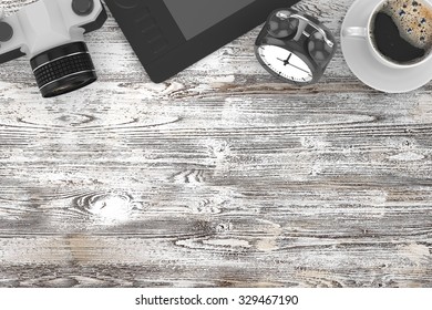 camera and coffee on table, workplace, top view