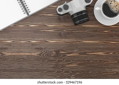camera and coffee on table, workplace, top view