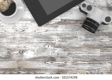 camera and coffee on table, workplace, top view