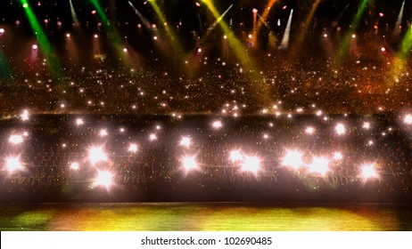 camera flash in concert with yellow spotlight