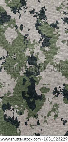 Camouflage pattern cloth texture. Abstract background and texture for design.