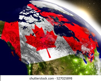 Canada with embedded flag on planet surface during sunrise. 3D illustration with highly detailed realistic planet surface and visible city lights. Elements of this image furnished by NASA.