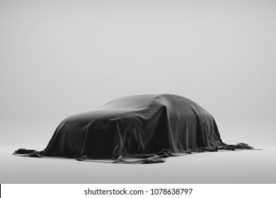 The Car Is Covered With A Dark Cloth In A White Photo Studio. 3d Rendering