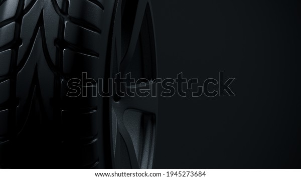 Car summer tires on a\
black background. 3D rendering of a wheel for a car. 3D rendering\
illustration.