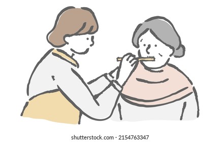 Care Worker Is Doing Dentifrice For Elderly Woman