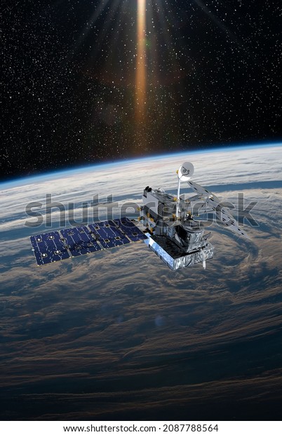 Cargo space craft Earth planet.Dark\
background. Sci-fi wallpaper.Space Station Orbiting Earth.Space\
ship.Space art wallpaper.Solar Observatory.Elements of this image\
furnished by NASA.3D\
illustration.