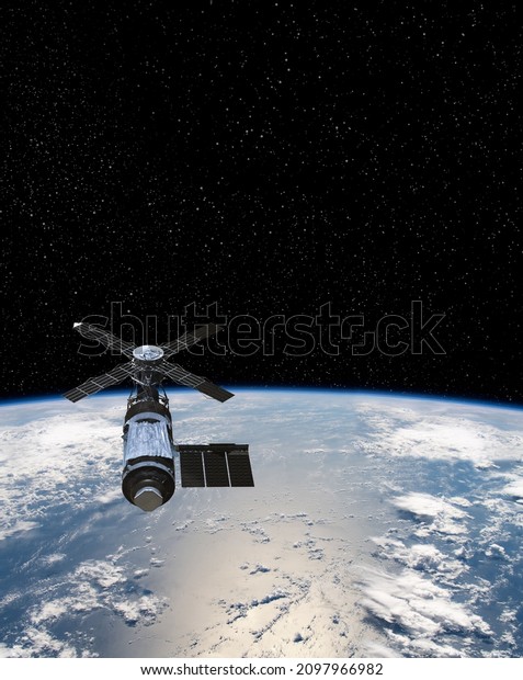 Cargo space craft Earth planet.Dark
background. Sci-fi wallpaper.Space Station Orbiting Earth.Space
ship.Space art wallpaper.Solar Observatory.Elements of this image
furnished by NASA.3D
illustration.