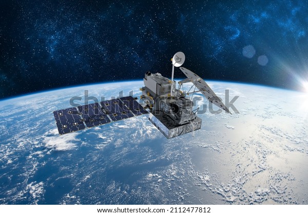Cargo space craft Earth planet.Dark\
background. Sci-fi wallpaper.Space Station Orbiting Earth.Space\
ship.Space art wallpaper.Solar Observatory.Elements of this image\
furnished by NASA.3D\
illustration.
