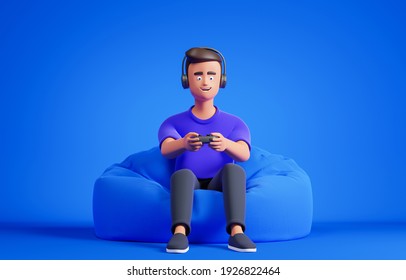 Cartoon Character Man On Bag Armchair Play Video Game With Gamepad And Headphones Over Blue Background. Online Gaming And Cyber Sport Concept. 3d Render Illustration.