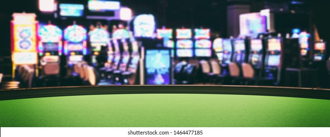 Casino interior, slot machines concept. Roulette table with green felt, blur slot machines room background, banner, copy space. 3d illustration