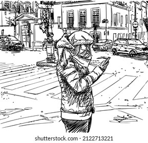 Casual Girl In Warm Winter Clothes Stands In City On Street At Intersection And Uses Smartphone. Cityscape Sketch, Paris Hand Drawn Illustration