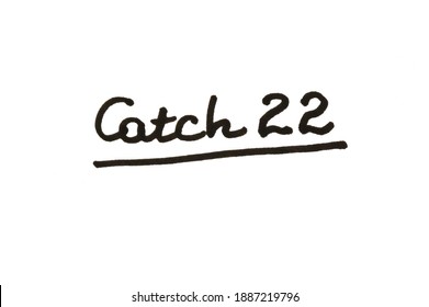 Catch 22! Handwritten Message On A White Background.