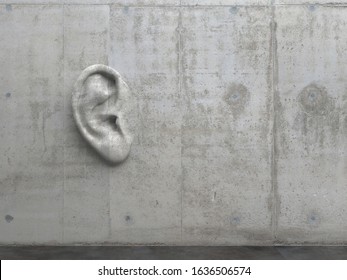 Cement sculpture in the shape of a human ear on a concrete wall. Illustration of the metaphor "Even walls have ears." Creative conceptual modern art with copy space. 3D rendering