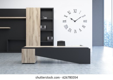 CEO Office Interior With A Modern Black Desk, A Bookcase And A Giant Clock Hanging On A White Wall. 3d Rendering.