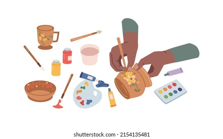 Ceramist craftswoman drawing decoration on ceramic pottery clay jug during master class. creative occupation in workshop. Relax with handicraft, handmade decor. Acrylic watercolor paints, cup - Powered by Shutterstock