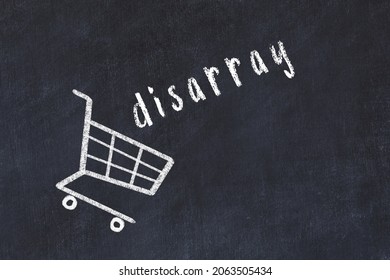 Chalk drawing of shopping cart and word disarray on black chalboard. Concept of globalization and mass consuming.