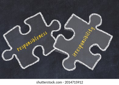 Chalk drawing of two puzzles with words responsibleness and irresponsibility. Concept of solving problems