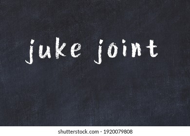 Chalk Handwritten Inscription Juke Joint On Black Desk