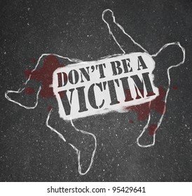 A Chalk Outline Of A Dead Body Symbolizing Someone Who Has Been Victimized By Crime And The Words Don't Be A Victim Stenciled Across It