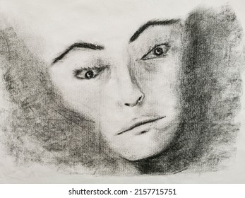 Charcoal Drawing Of A Female Face With A Lost And Pensive Look. Copy Space.