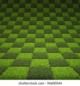 Checkerboard Background Of Green Grass.