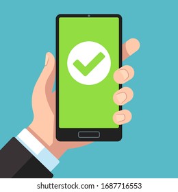 Checkmark On Smartphone Screen. Hand Holding Smartphone With Green Tick. Phone Surveys Technology, Website App Testing Approved Payment Or Flat Success Completed Transaction Concept