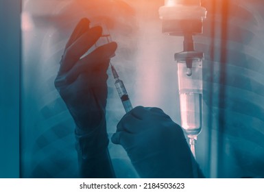 Chemotherapy Drug Treatment Cancer Lung Film X-ray.Medical Holding Syringe Needle Hypodermic Injection  Iv Saline Drip Vitamin Doctor Vaccine  Covid 19 Coronavirus Monkeypox 3d Illustration Rendering