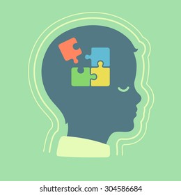 Child Head Silhouette With Jigsaw Puzzle Symbolizing Autism Spectrum Disorders