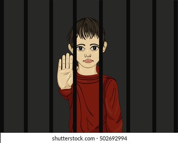 The Child In Prison. Children Of Criminals. Behind Bars. Juvenile Criminals. Angry And Unhappy Boy Showing Hand Sign Enough. Against Violence. Stop The Violence. 