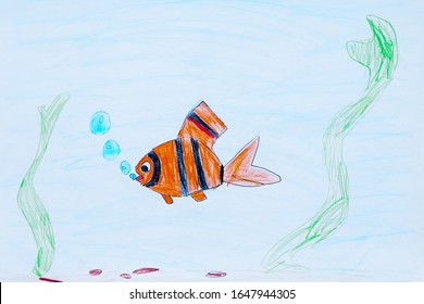 Child's Drawing Of Fish Under The Sea On White Sheet Of Paper.