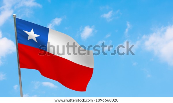 Chile flag\
on pole. Blue sky. National flag of\
Chile
