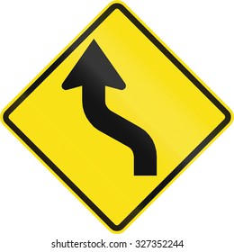 Chilean Road Warning Sign: Reverse Curve First To Left