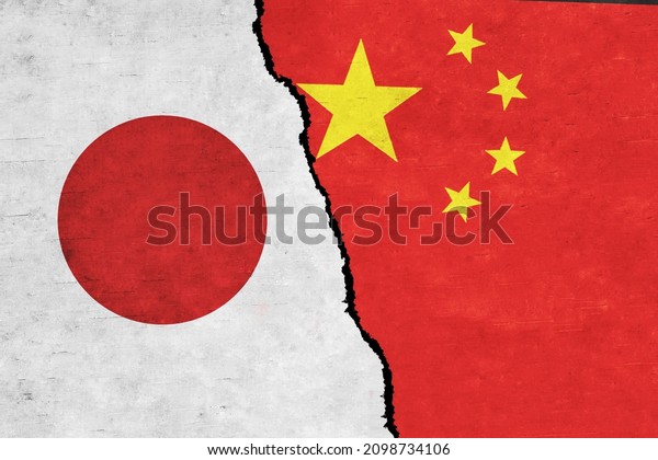 China and Japan painted flags on a wall with a\
crack. China and Japan\
relations