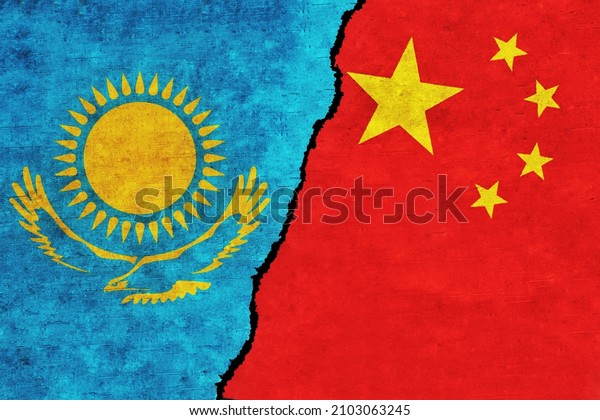 China and Kazakhstan painted flags on a wall
with a crack. China and Kazakhstan relations. Kazakhstan and China
flags together