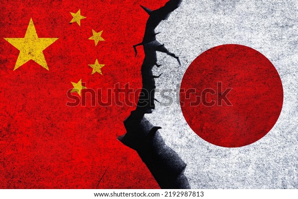 China vs Japan concept flags on a wall with a\
crack. Japan and China political conflict, war crisis, economy,\
relationship, trade\
concept