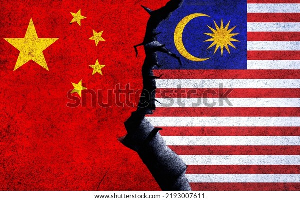 China vs Malaysia concept flags on a wall with a\
crack. Malaysia and China political conflict, war crisis, economy,\
relationship, trade\
concept