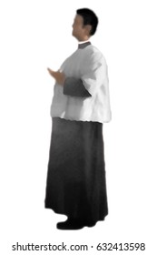 Christian catholic priest or an altar boy or server in black cassock and white surplice